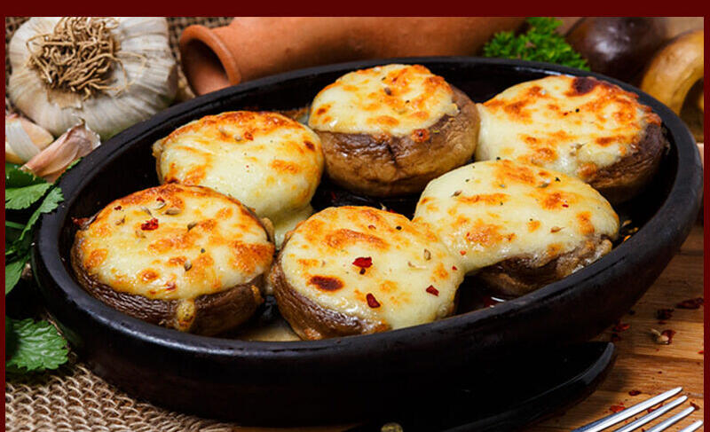 Mushrooms With Cheese In Clay Pot